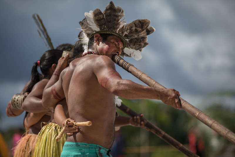 Moisés Brazão, master of Japurutu, participates in a dance during the inauguration of the water supply system powered by hydraulic ram, in the Santa Isabel community, located in the Alto Rio Negro Indigenous Land (AM), close to the Ayari River @Carol Quintanilha / ISA
