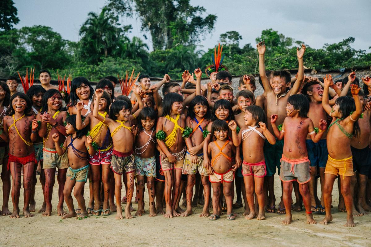 Children have fun in the center of the Xihopi maloca, Yanomami Indigenous Land