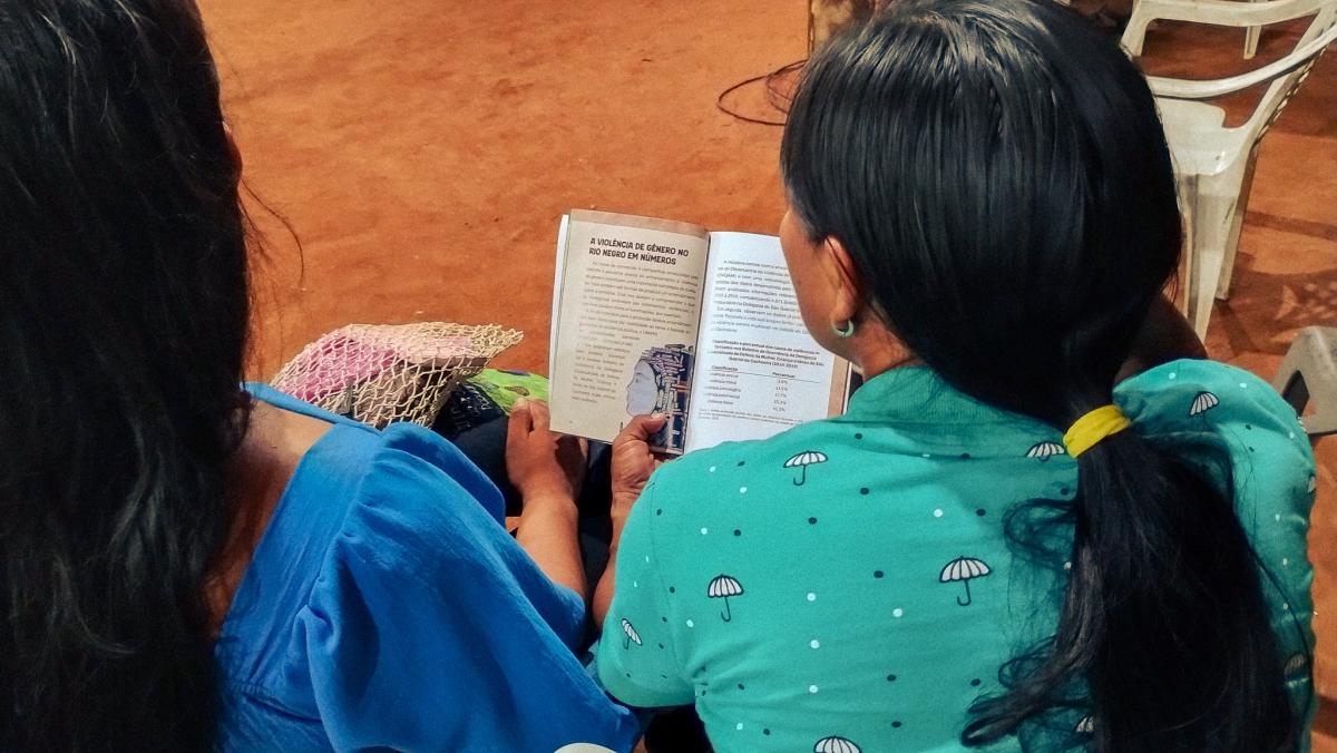 As participantes receberam a versão impressa do livreto durante o evento