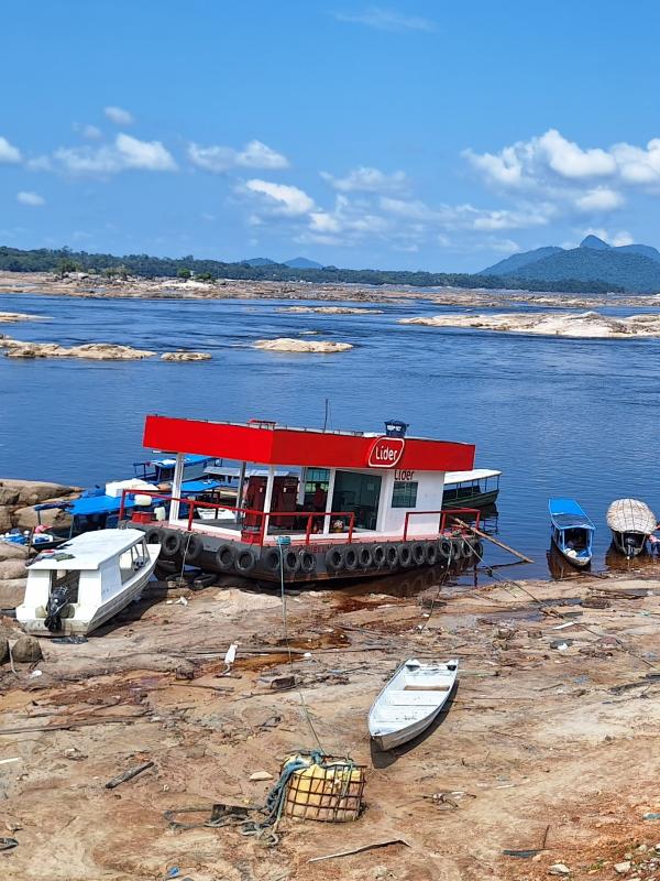 Floating gas station is moored on dry land in Queiroz Galvão port, in São Gabriel